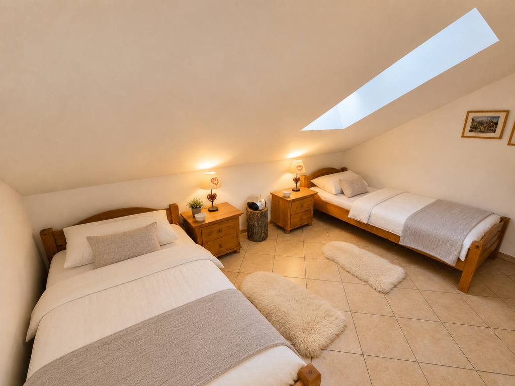 Schlafzimmer mit zwei Einzelbetten für bis zu zwei Personen
